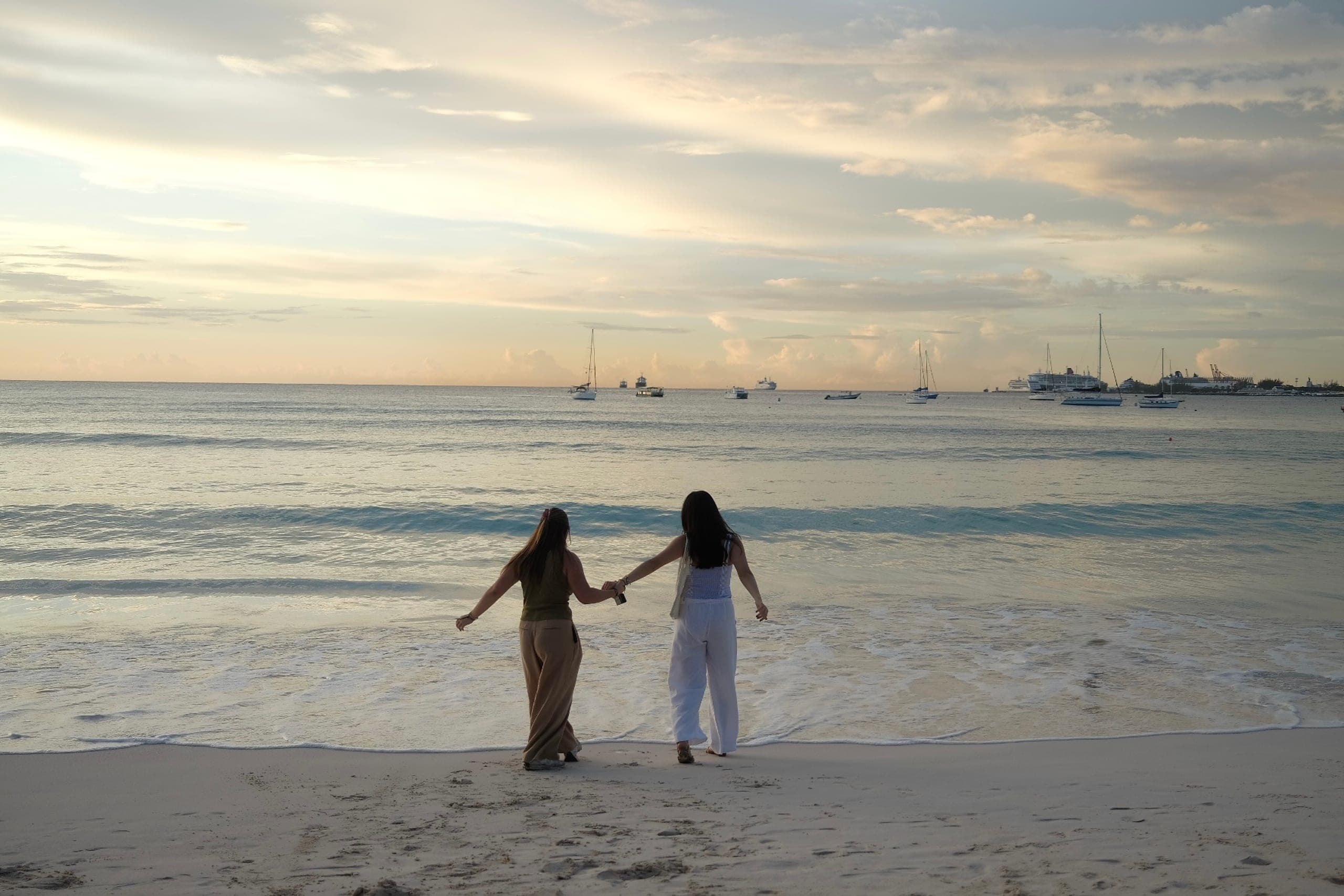 Hand in hand, low tide — A harbor evening