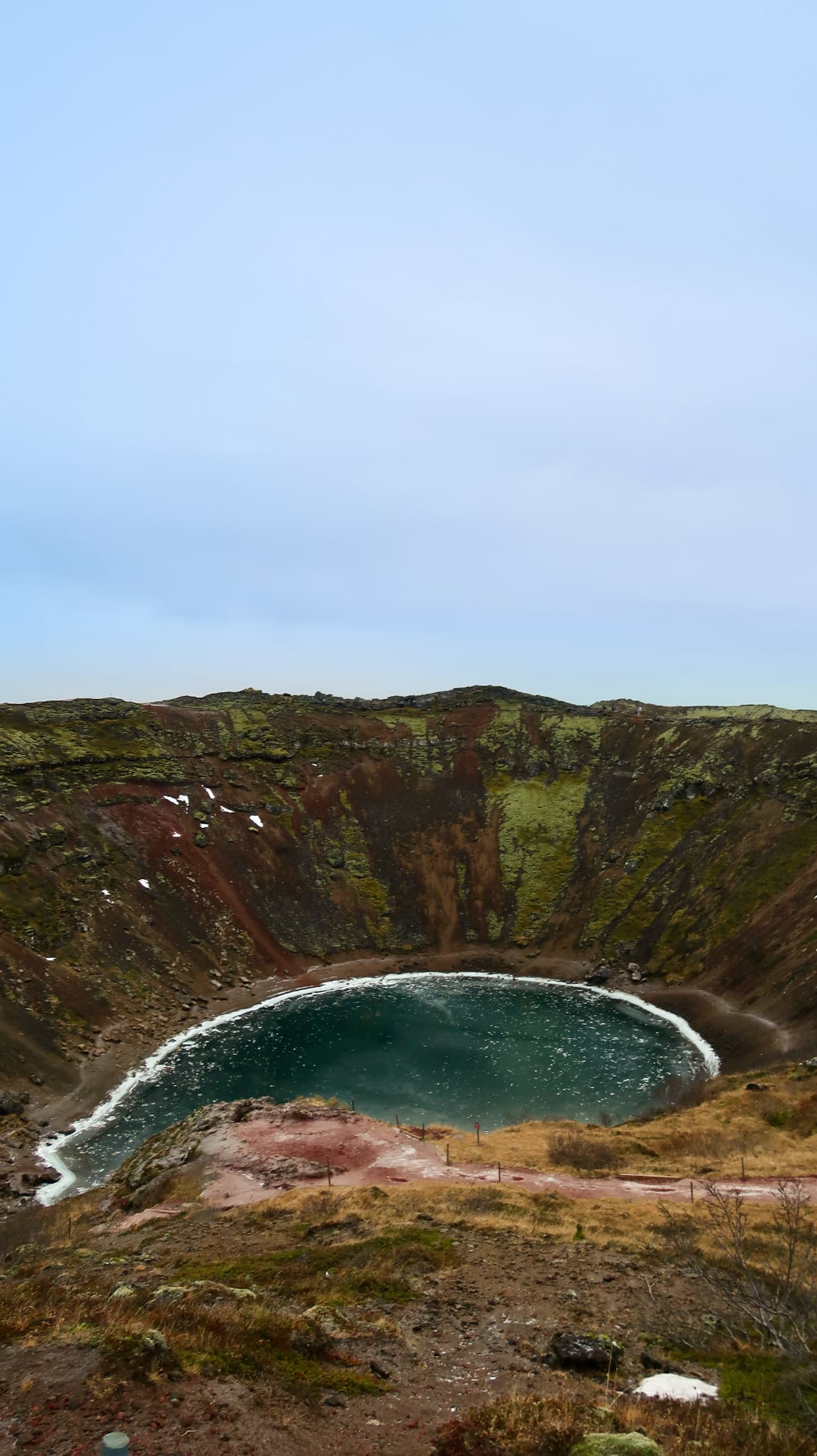 Kerið, the crater's teal water — Iceland